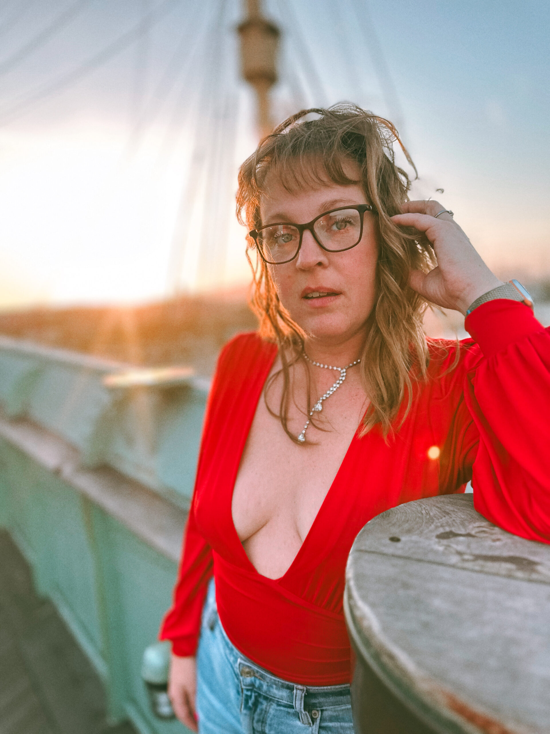 Jessica on deck at sunset in red top