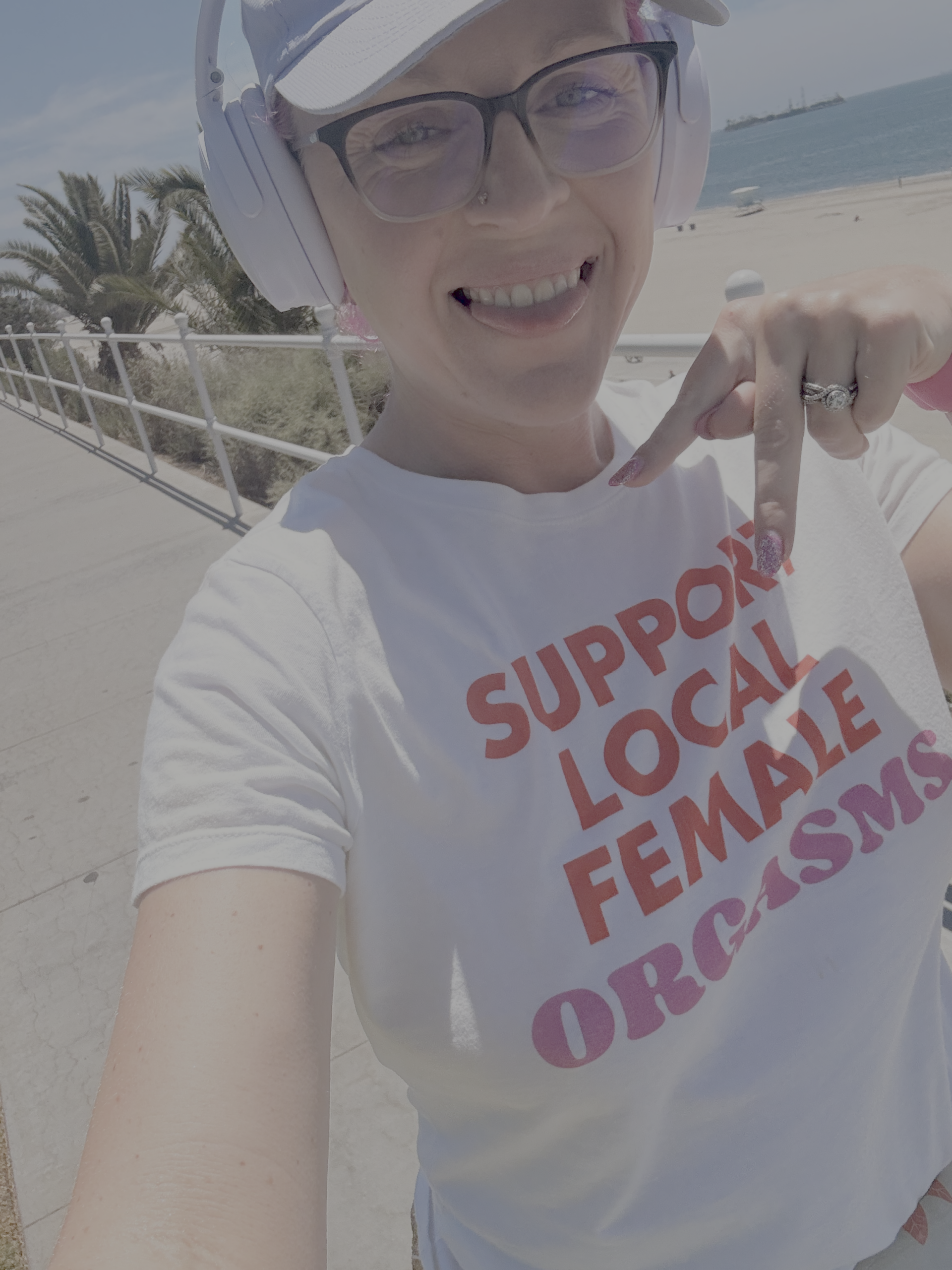 Glitoris wearing a Support Local Female Orgasms t-shirt